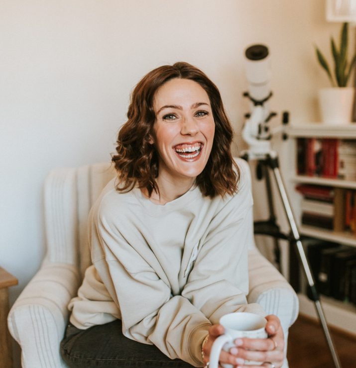 Woman laughing into the camera